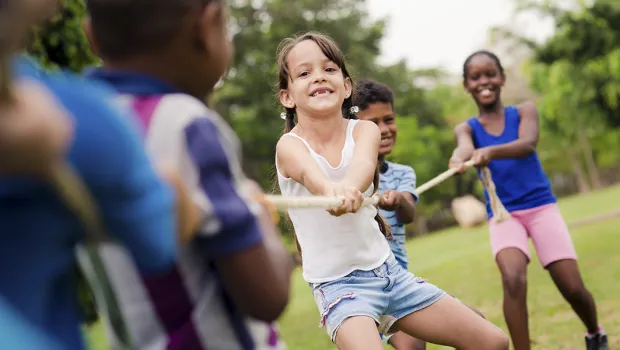 web3-kids-playing-park-outside-ideas-boredom-shutterstock_119611549-diego-cervo-ai